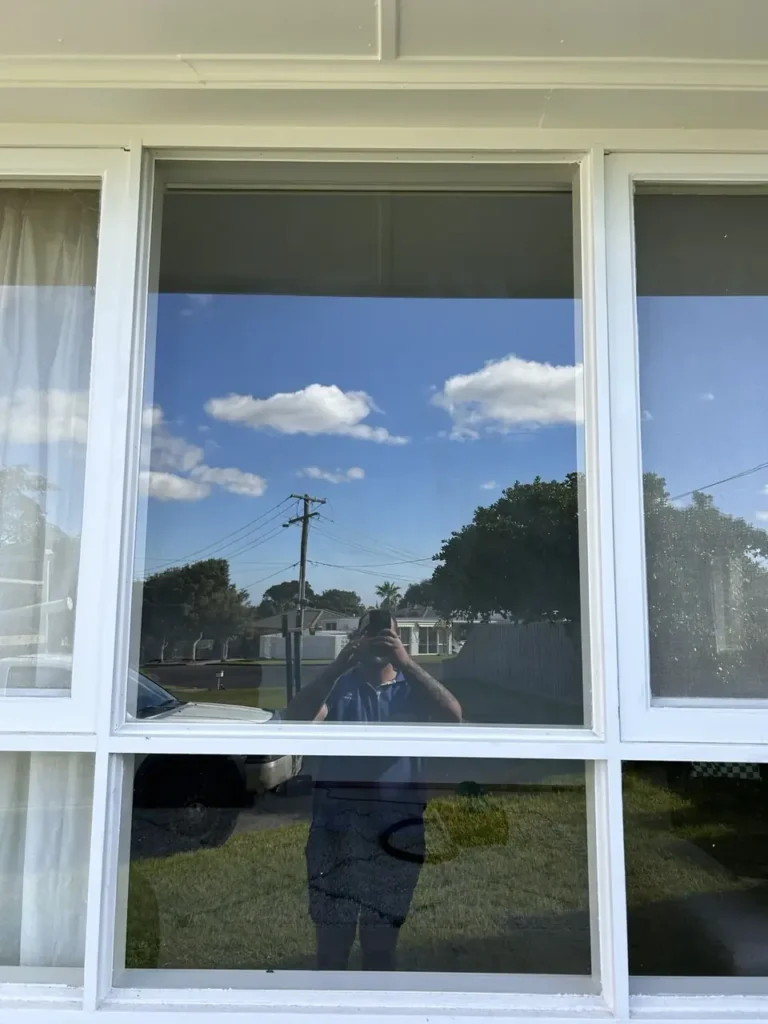 Residential window with clear replacement glass fitted