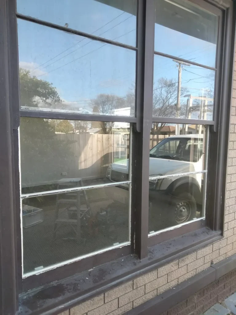 Existing timber windows reglazed with 5 mm glass and fresh putty by ACW Glazing & Maintenance